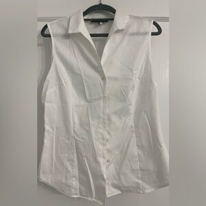 Sleeveless button up white shirt.  Very nice for work.